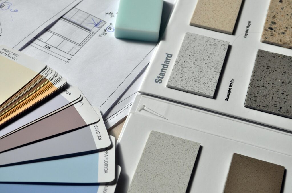Custom home building design selections including flooring, countertops, and cabinet finishes
