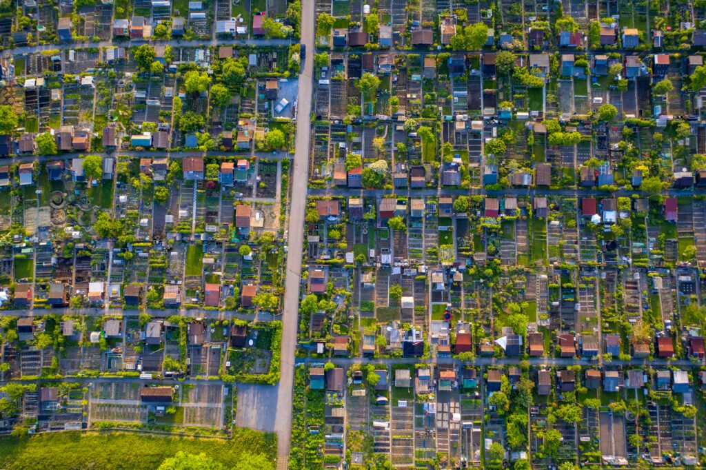 Dense Utah residential neighborhood aerial showing housing market inventory and buyer demand patterns in established community