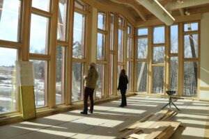 Homebuyers inspecting new construction home interior during Utah housing market building process 2025