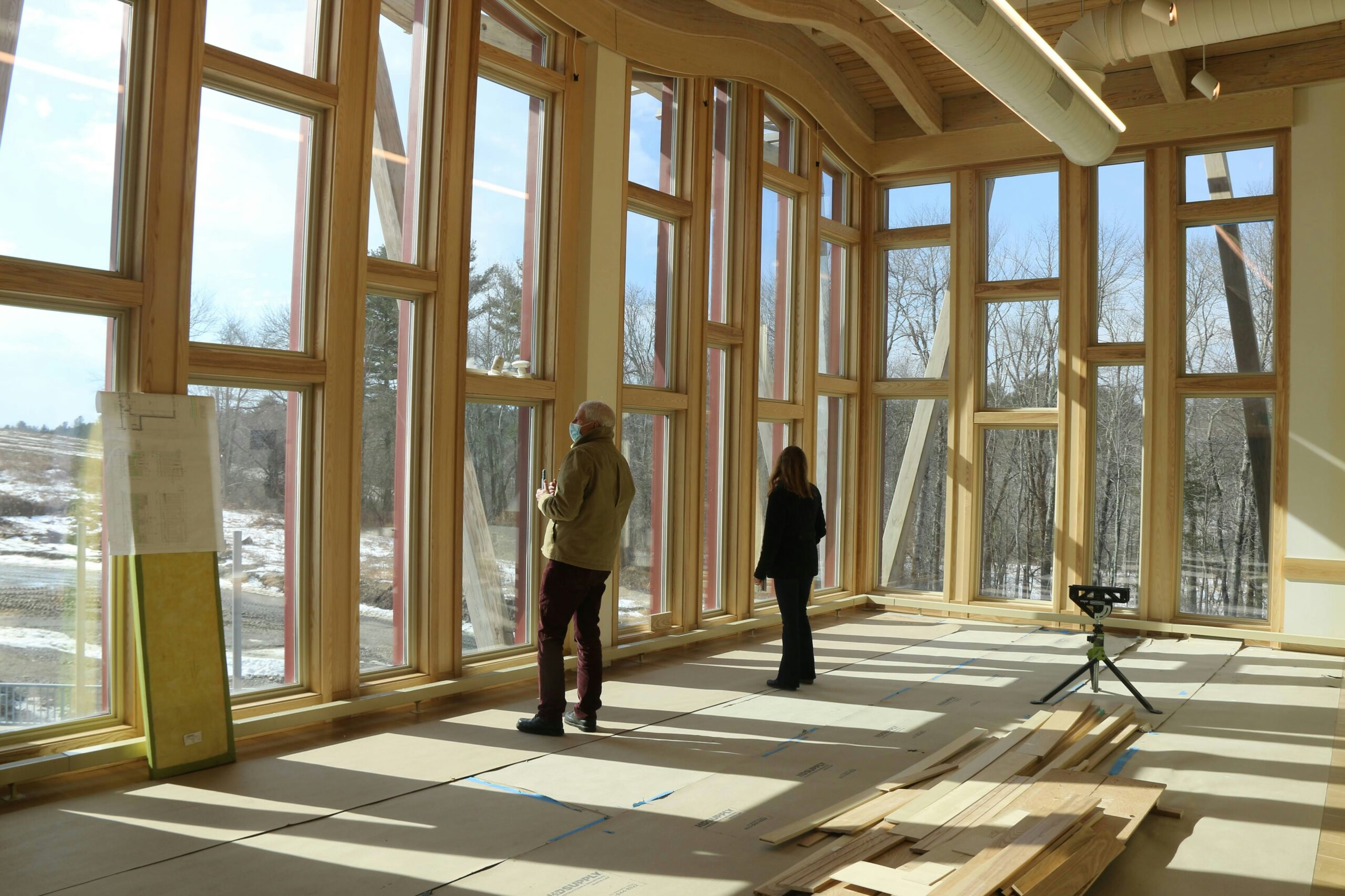 Homebuyers inspecting new construction home interior during Utah housing market building process 2025