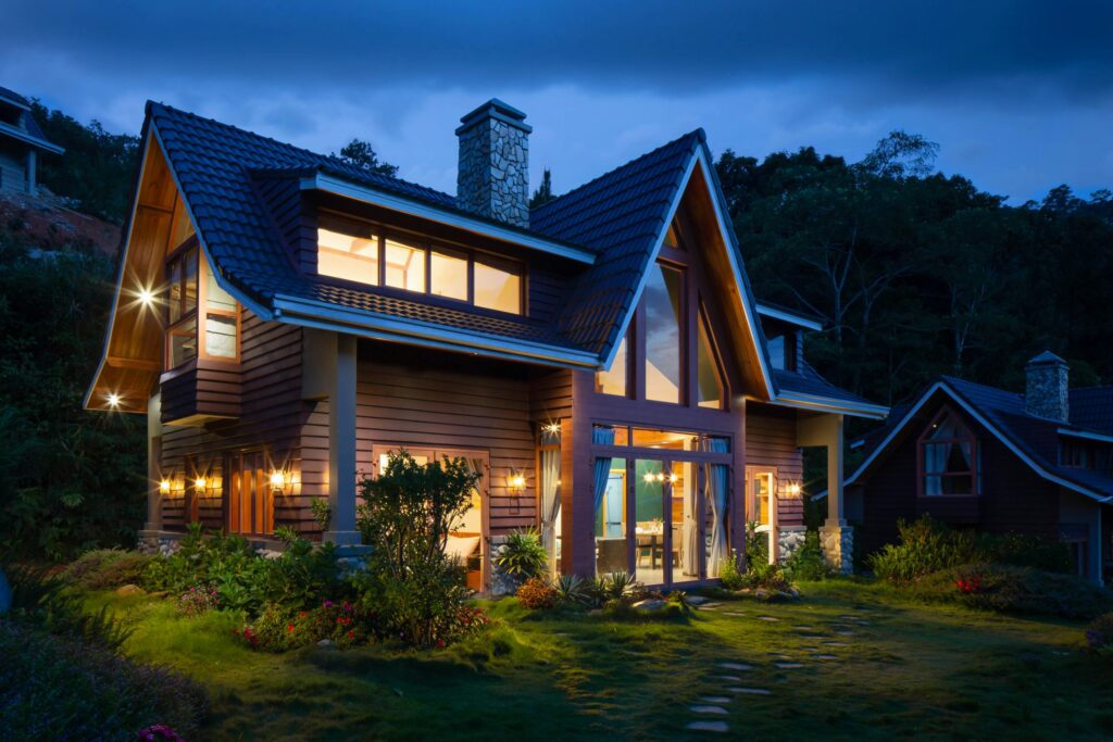 Beautiful custom home at twilight showing long-term home value and real estate investment potential in Utah housing market