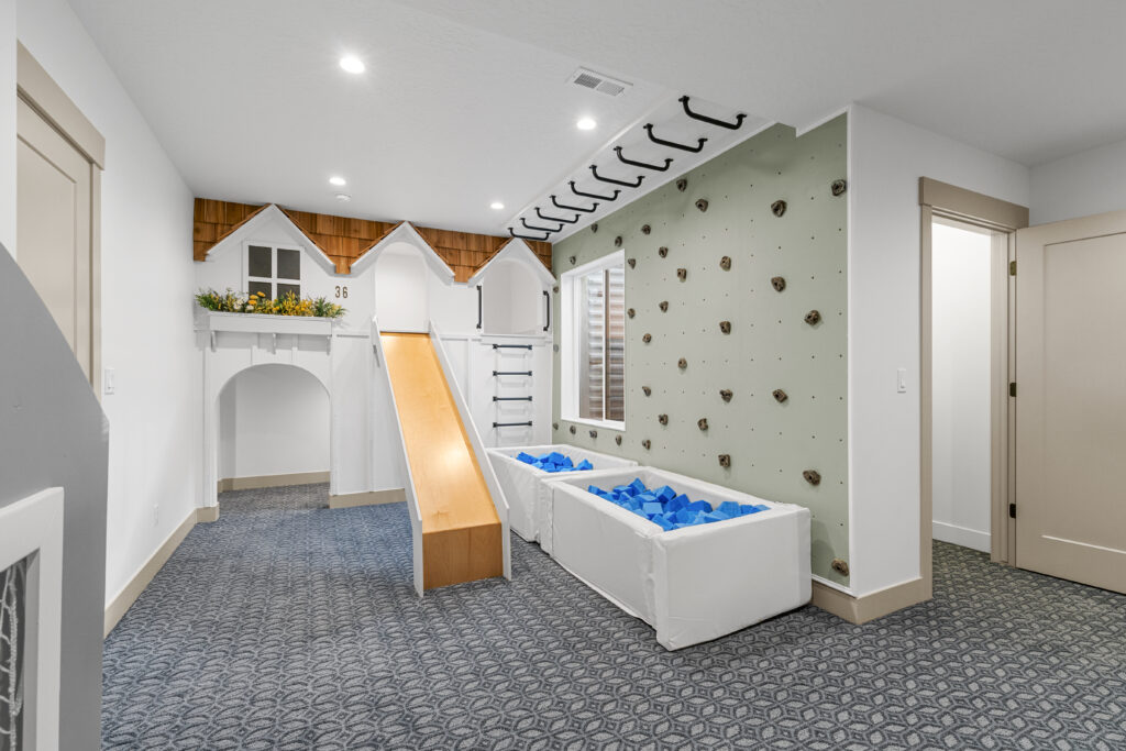 Kids playroom in basement of beautiful home.