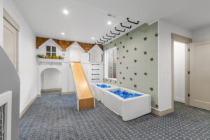 Beautiful playroom in a furnished underground basement.